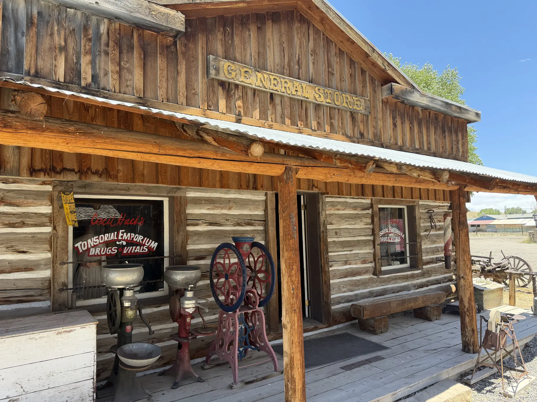 The log exterior and covered boardwalk of the museum's general store